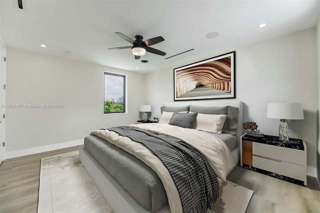 1617 NE 11th St Unit 1, Fort Lauderdale, FL 33304 - bedroom featuring wood finished floors, baseboards, a ceiling fan, and recessed lighting