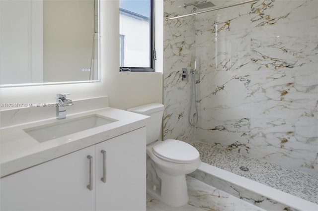 1617 NE 11th St Unit 1, Fort Lauderdale, FL 33304 - bathroom featuring toilet, a marble finish shower, and vanity