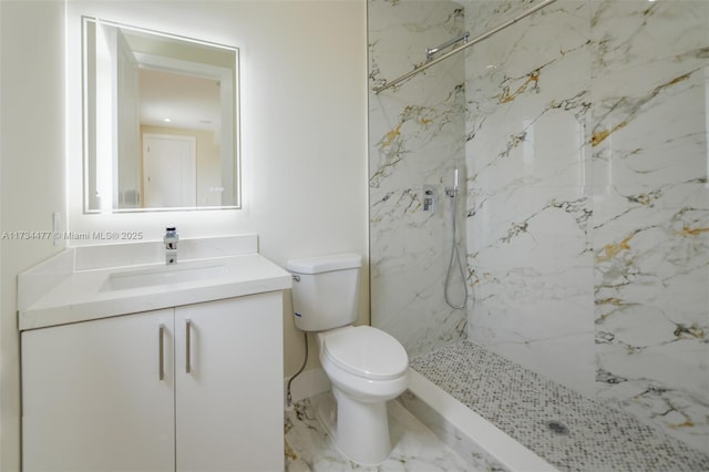 1617 NE 11th St Unit 1, Fort Lauderdale, FL 33304 - bathroom featuring toilet, vanity, and a marble finish shower