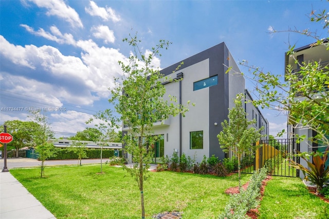 1617 NE 11th St Unit 1, Fort Lauderdale, FL 33304 - view of home's exterior with stucco siding