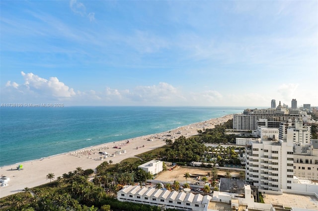 aerial view featuring a view of the beach and a water view