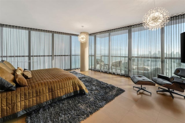 bedroom featuring a notable chandelier