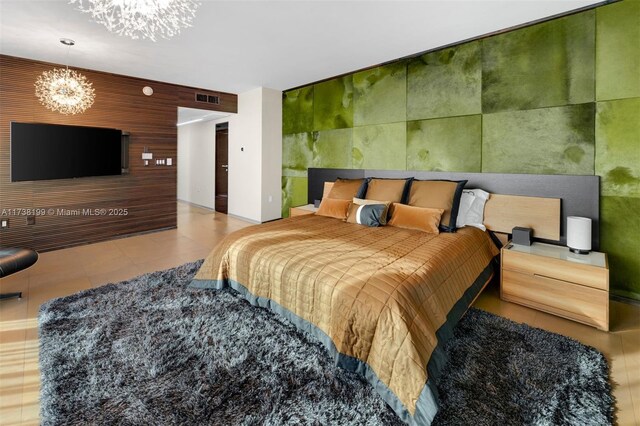 bedroom featuring a chandelier