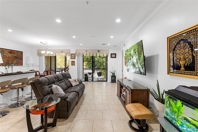 living room with crown molding, a chandelier, and light tile patterned floors