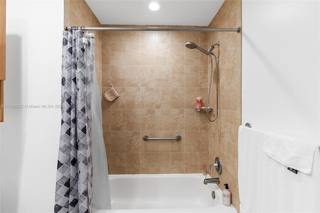 bathroom featuring shower / bath combo with shower curtain