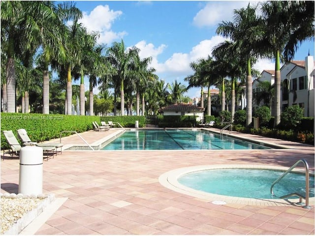 view of pool with a patio area