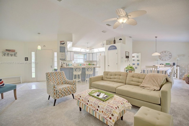 living room with light carpet, vaulted ceiling, and ceiling fan