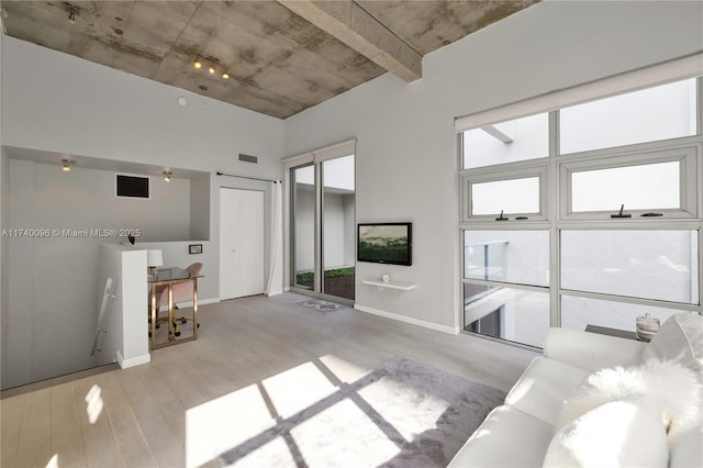 living room with light hardwood / wood-style flooring