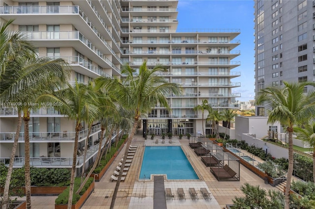 view of swimming pool featuring a patio