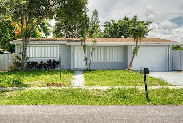 658 SW 1st Ct, Boynton Beach, FL 33426 - ranch-style house with an attached garage, concrete driveway, a front lawn, and stucco siding