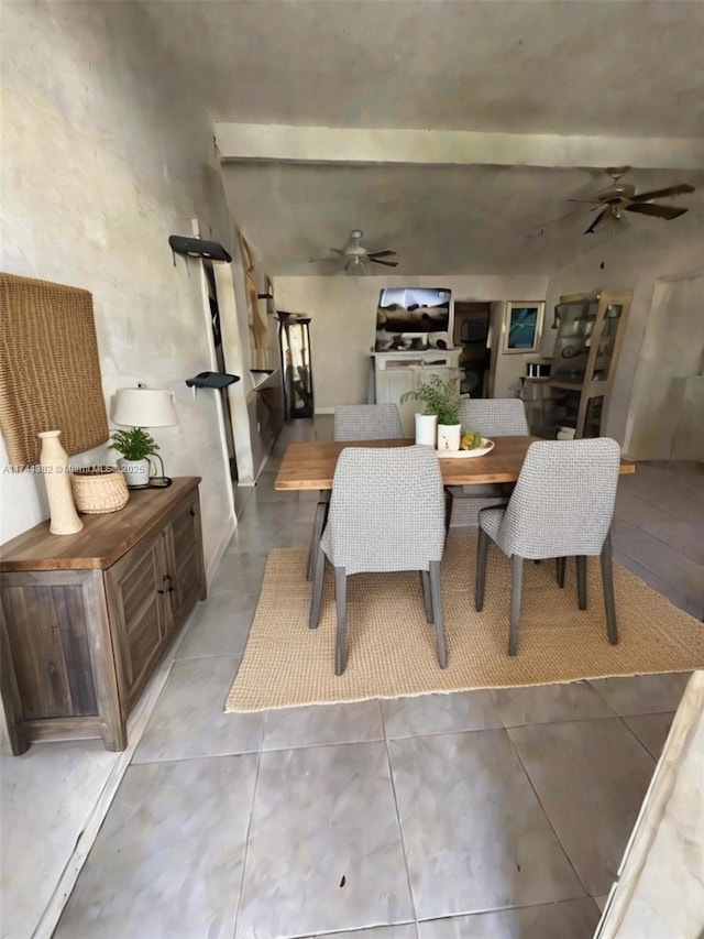 dining room featuring light tile patterned flooring and ceiling fan