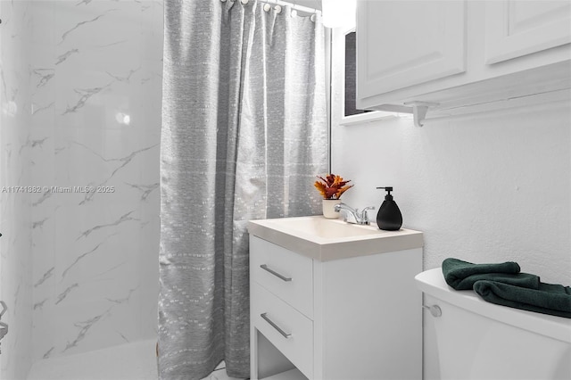 658 SW 1st Ct, Boynton Beach, FL 33426 - full bathroom featuring vanity and a marble finish shower