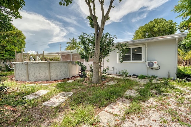 658 SW 1st Ct, Boynton Beach, FL 33426 - view of yard featuring an outdoor pool