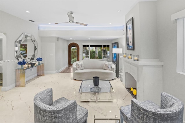 living room featuring ceiling fan