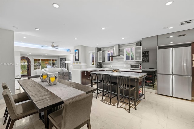 dining area featuring ceiling fan