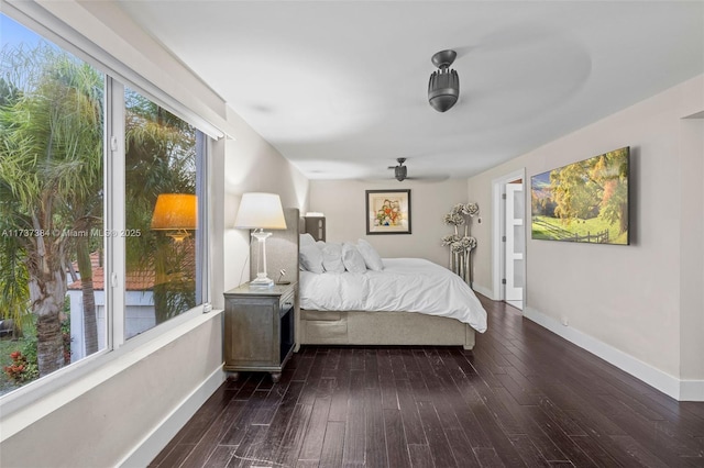 bedroom featuring dark wood-type flooring and ceiling fan