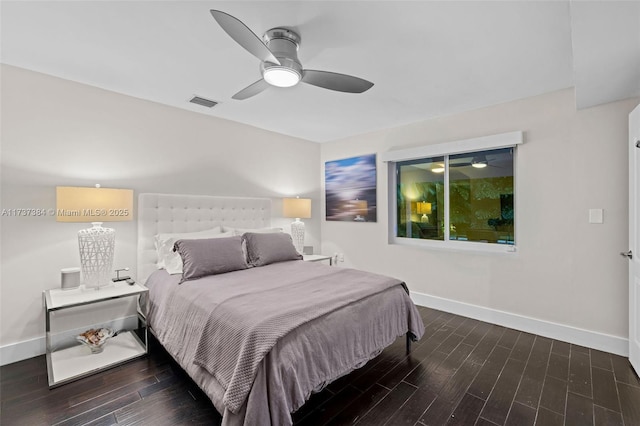 bedroom featuring dark hardwood / wood-style flooring and ceiling fan