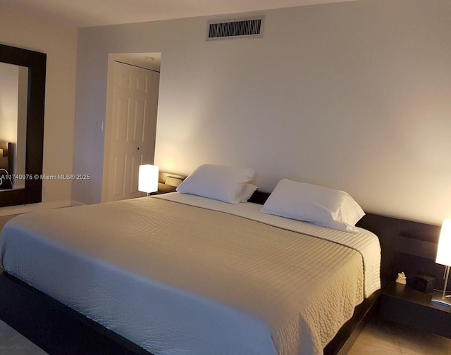 bedroom with visible vents