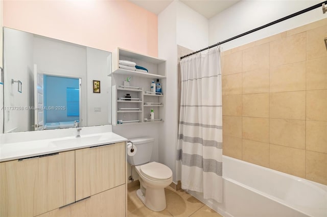 full bathroom featuring tile patterned floors, toilet, shower / bath combo with shower curtain, and vanity