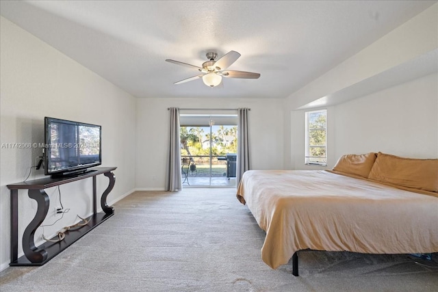 carpeted bedroom with access to exterior and ceiling fan