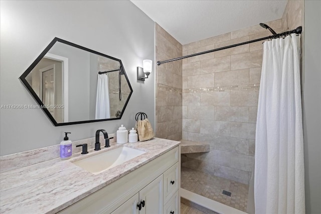 bathroom with vanity and walk in shower