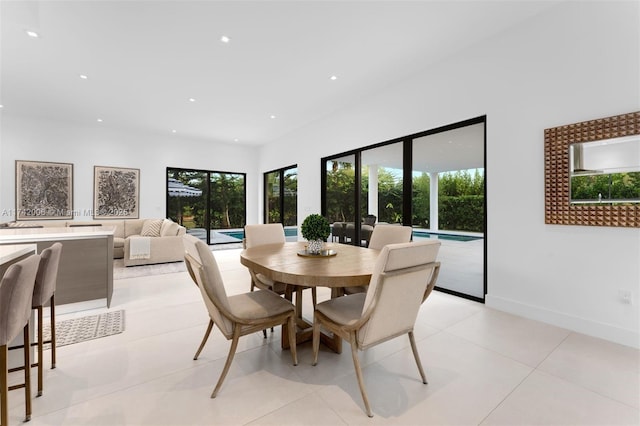 dining area with light tile patterned floors