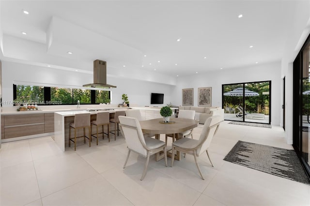 dining area featuring light tile patterned flooring