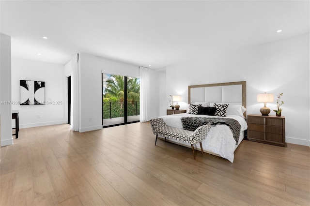 bedroom with access to exterior and light wood-type flooring