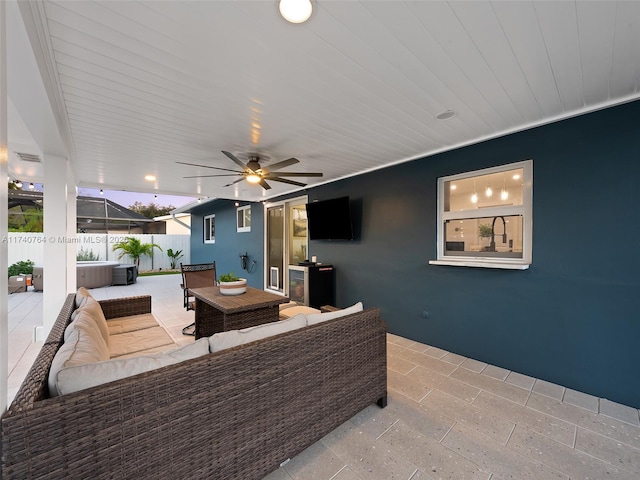 view of patio / terrace with ceiling fan and outdoor lounge area