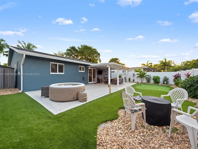 back of property with a patio area