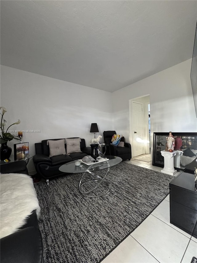 living room featuring light tile patterned flooring