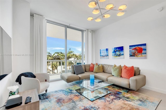 living room featuring light tile patterned flooring and floor to ceiling windows