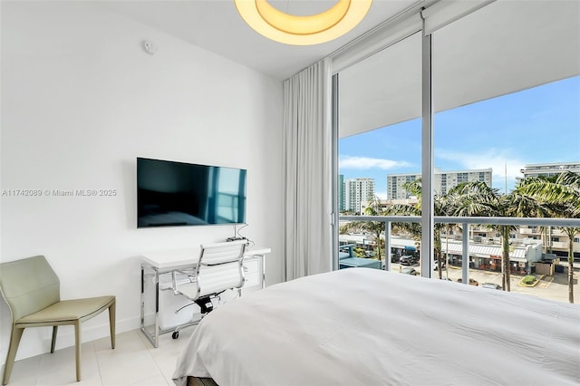 bedroom with light tile patterned floors