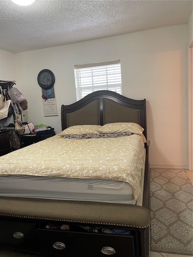 bedroom with a textured ceiling