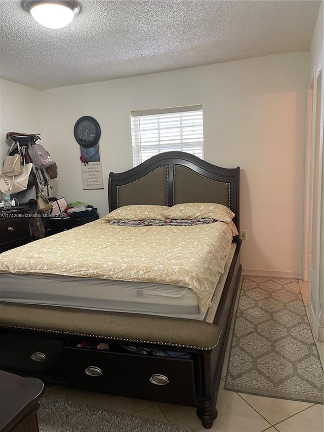 bedroom featuring a textured ceiling