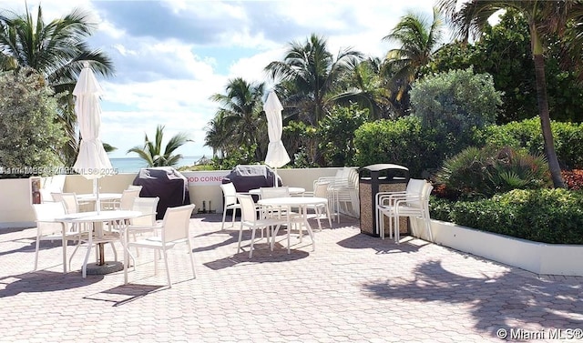 view of patio / terrace featuring a water view