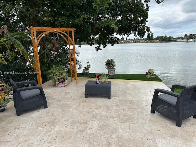 view of patio / terrace with a water view