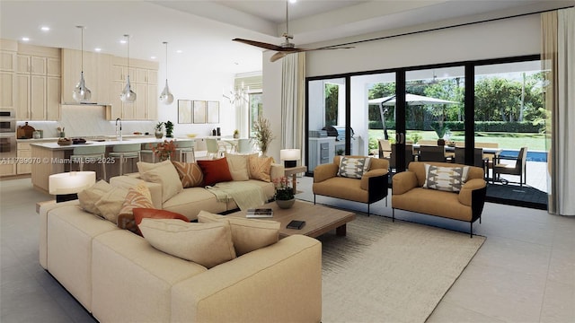 living room featuring a ceiling fan and recessed lighting