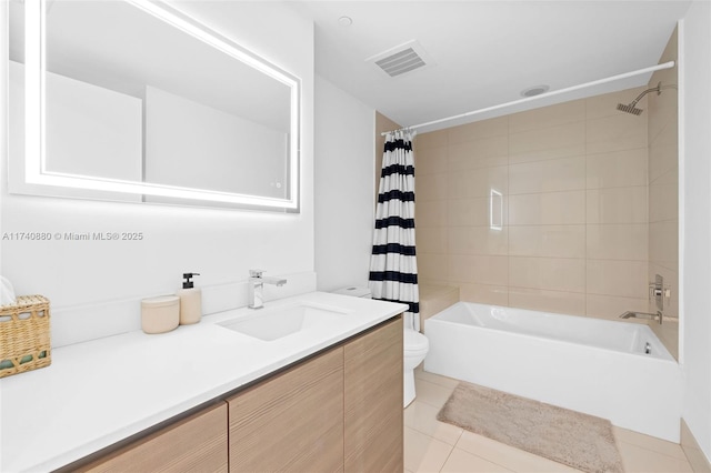 full bathroom featuring vanity, shower / bathtub combination with curtain, tile patterned floors, and toilet