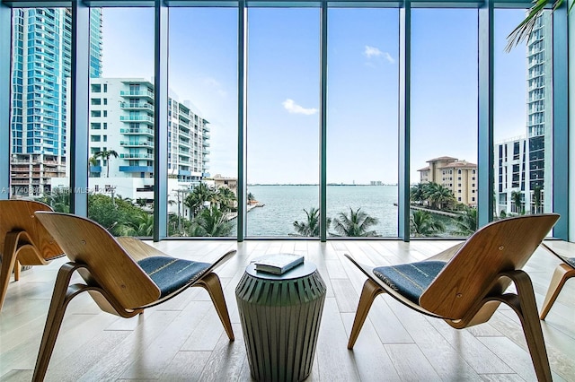 460 NE 28th St Unit 1404, Miami, FL 33137 - sunroom with healthy amount of natural light and a water view