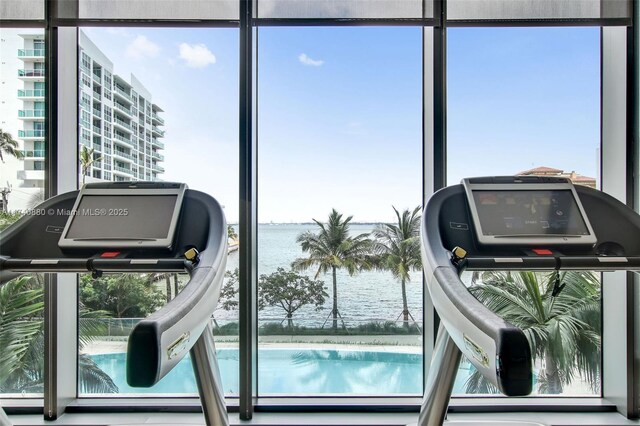 460 NE 28th St Unit 1404, Miami, FL 33137 - workout area featuring a water view