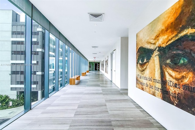 hallway with expansive windows