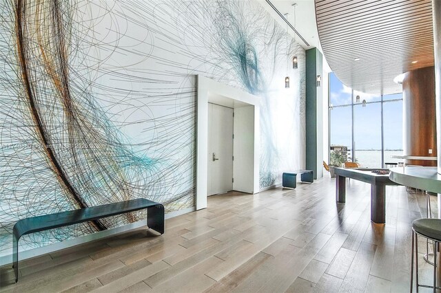 460 NE 28th St Unit 1404, Miami, FL 33137 - lobby featuring expansive windows and a high ceiling