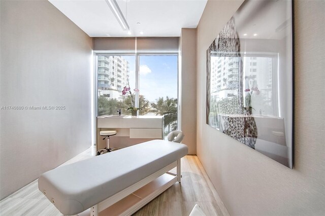 460 NE 28th St Unit 1404, Miami, FL 33137 - hall featuring a desk and wood finished floors