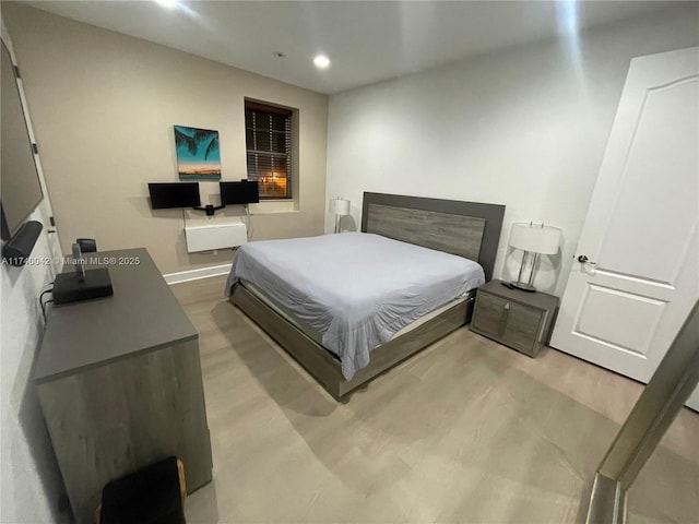 bedroom featuring light wood-type flooring