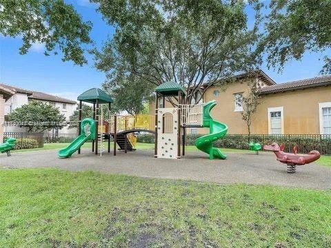 view of jungle gym with a lawn