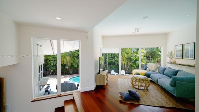 691 Ridgewood Rd, Key Biscayne, FL 33149 - living area featuring recessed lighting and hardwood / wood-style floors