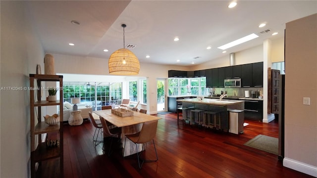 691 Ridgewood Rd, Key Biscayne, FL 33149 - dining space featuring recessed lighting, baseboards, dark wood finished floors, and visible vents