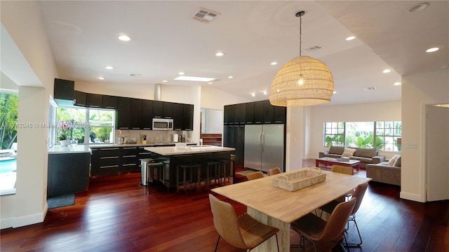 691 Ridgewood Rd, Key Biscayne, FL 33149 - dining area with recessed lighting, baseboards, dark wood finished floors, and visible vents