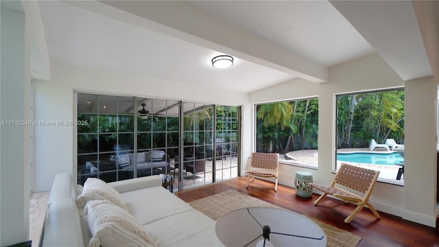 691 Ridgewood Rd, Key Biscayne, FL 33149 - sunroom / solarium with beamed ceiling and outdoor lounge area